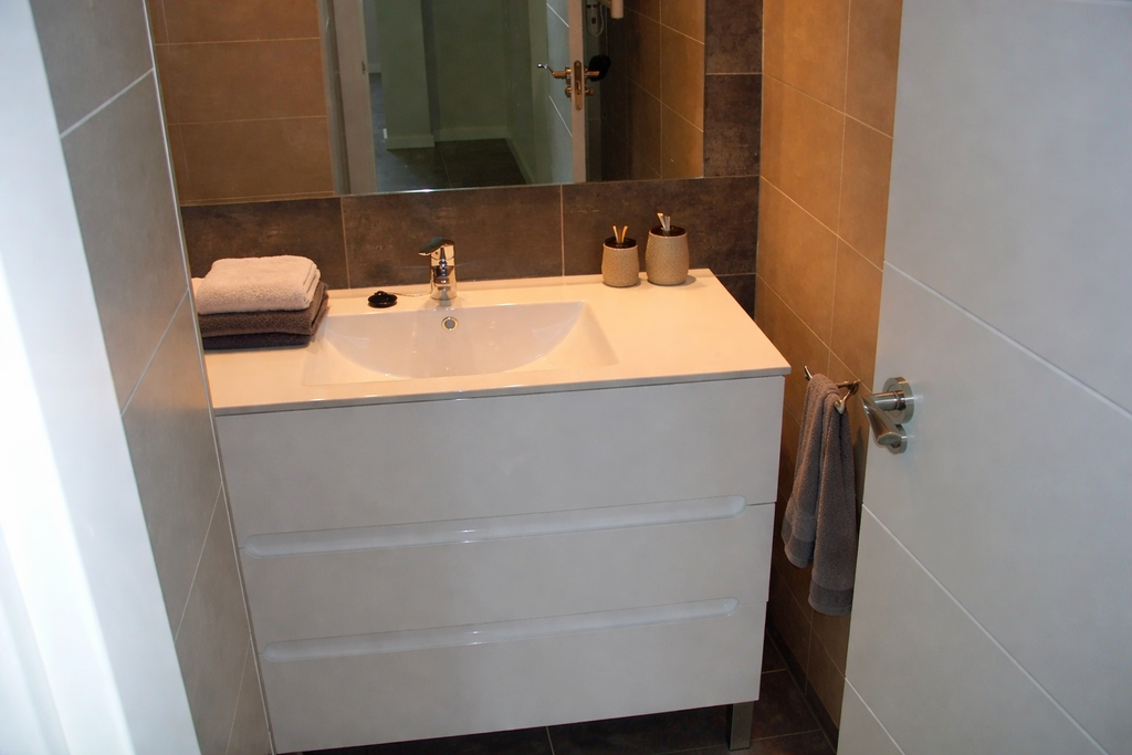 Modern bathroom with stylish accessories.png