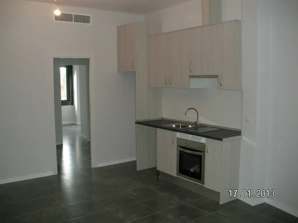 Apartamento en bajo con dos habitaciones y cocina americana
